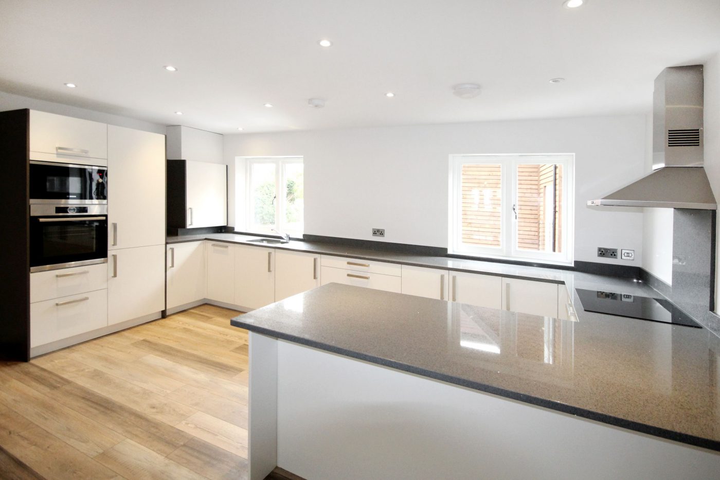 White kitchen with grey worktops